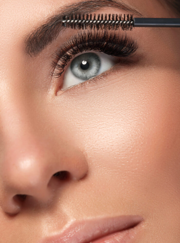 Beautiful woman with eyelash extension for maximum volume